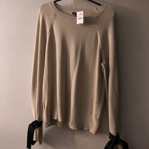 JCrew Sweater with bow tie on wrist